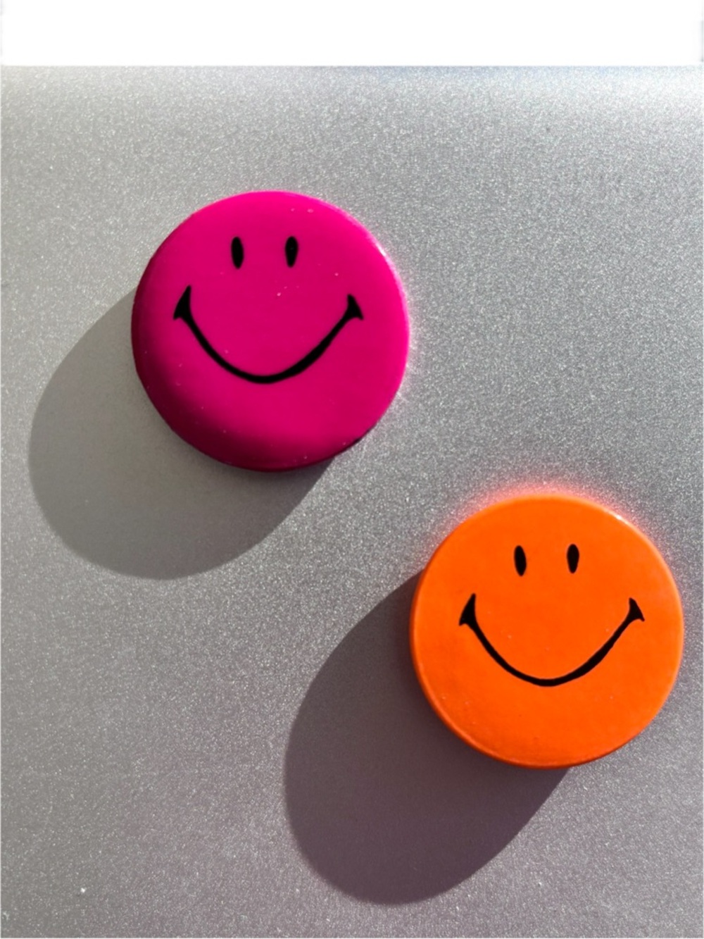 1990s dark magenta pink and neon orange smiley face button pins